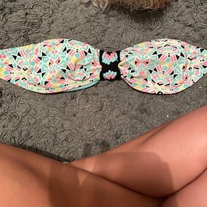 Super bright colorful top, cute for the summer.
